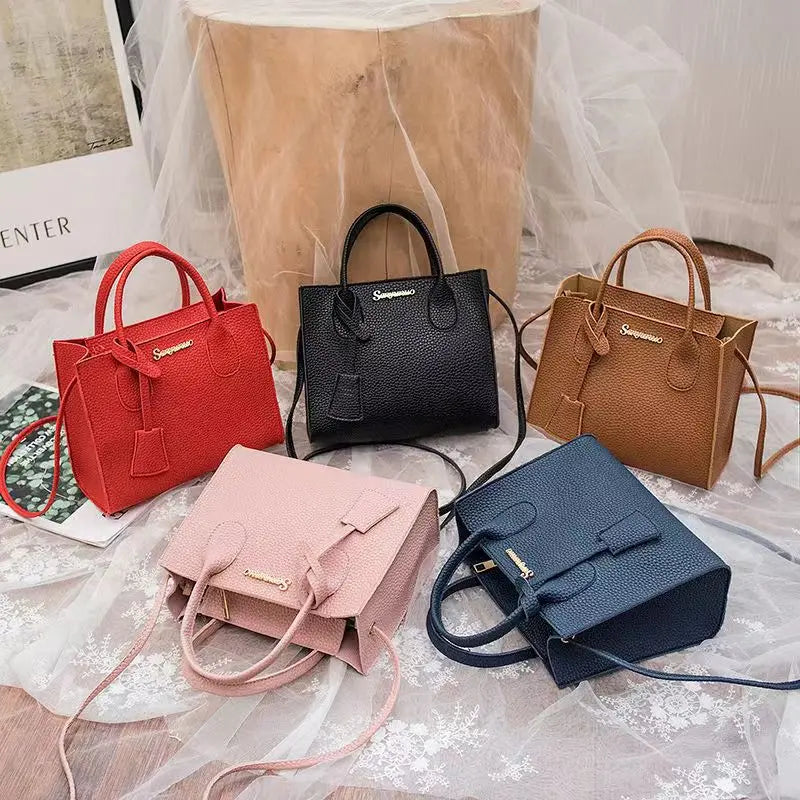 Bolsa Feminina em Couro Sintético - Estilo Versátil para Todas as Ocasiões!